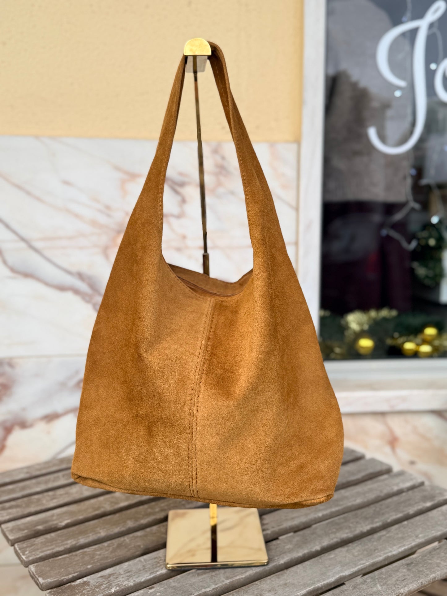 Mala de camurça com tachas