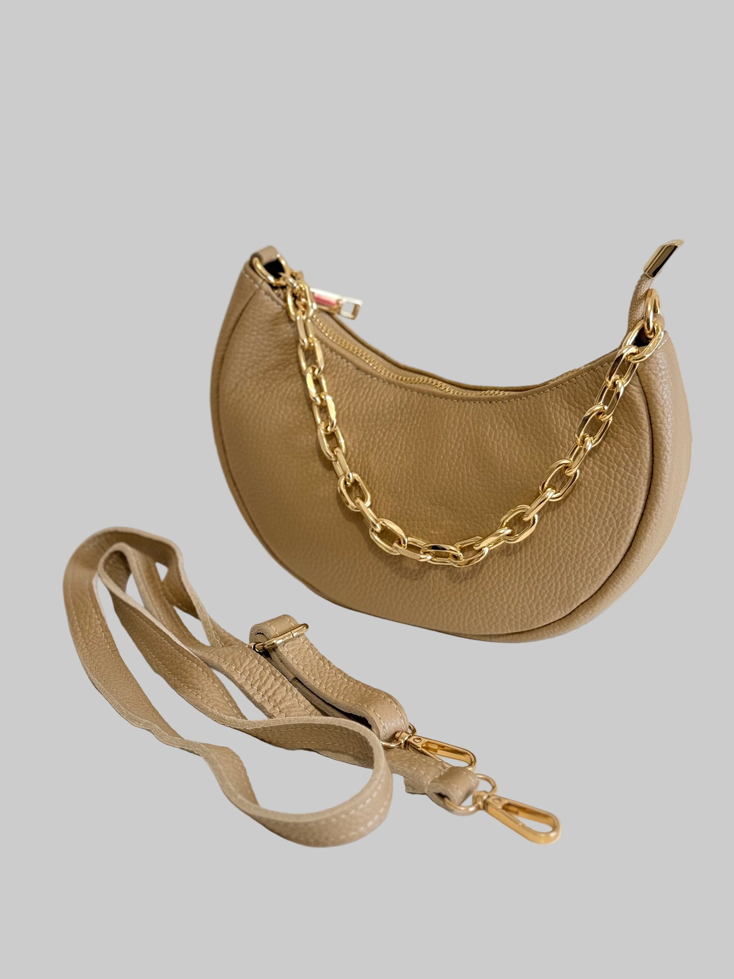 Mala em pele a tiracolo